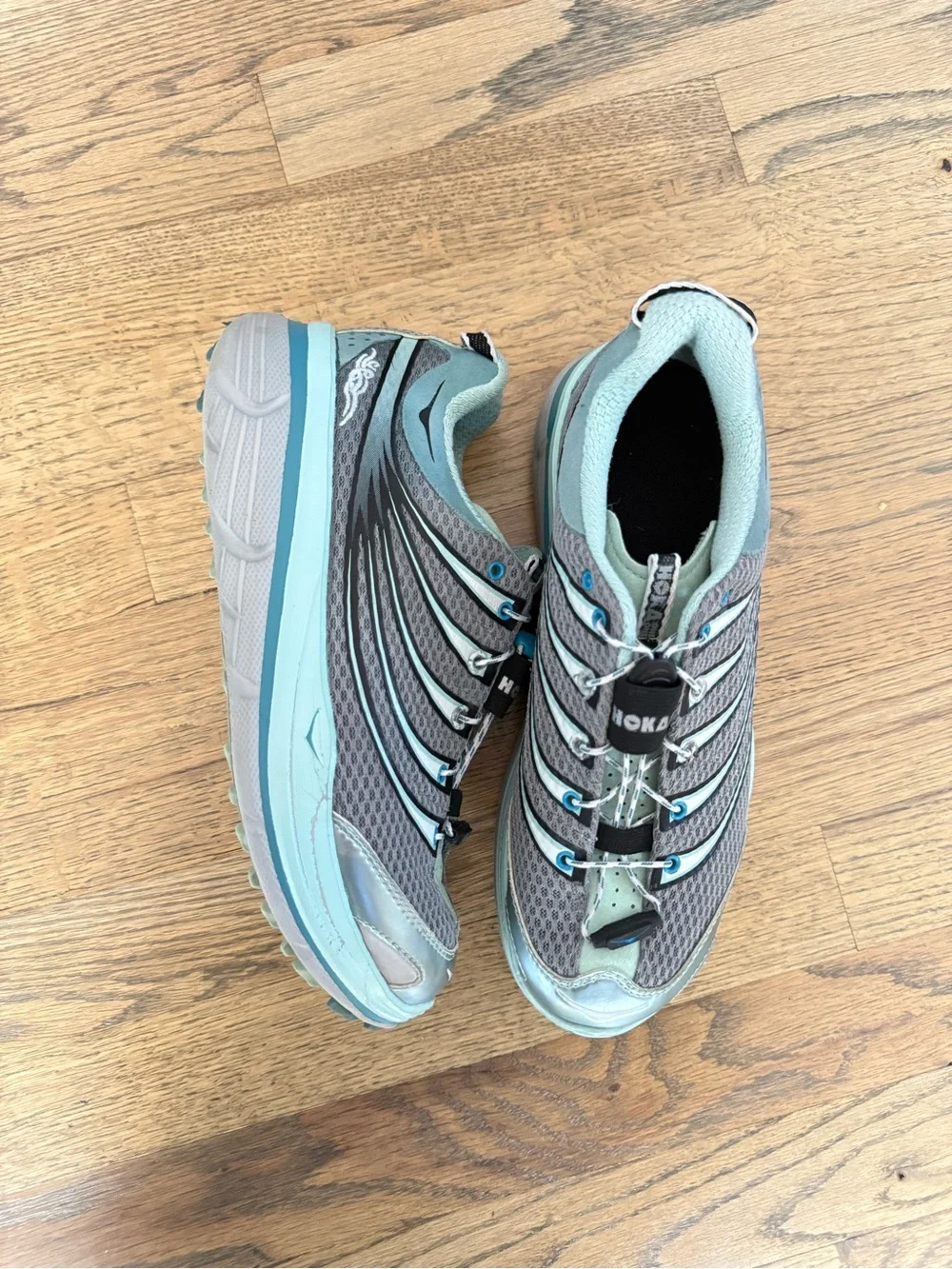 Hoka One One Women's Gray and Light Teal Trail Runners